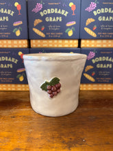 Load image into Gallery viewer, Bistro white ceramic candles with assorted embossed fruits and vegetables
