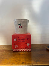 Load image into Gallery viewer, Bistro white ceramic candles with assorted embossed designs
