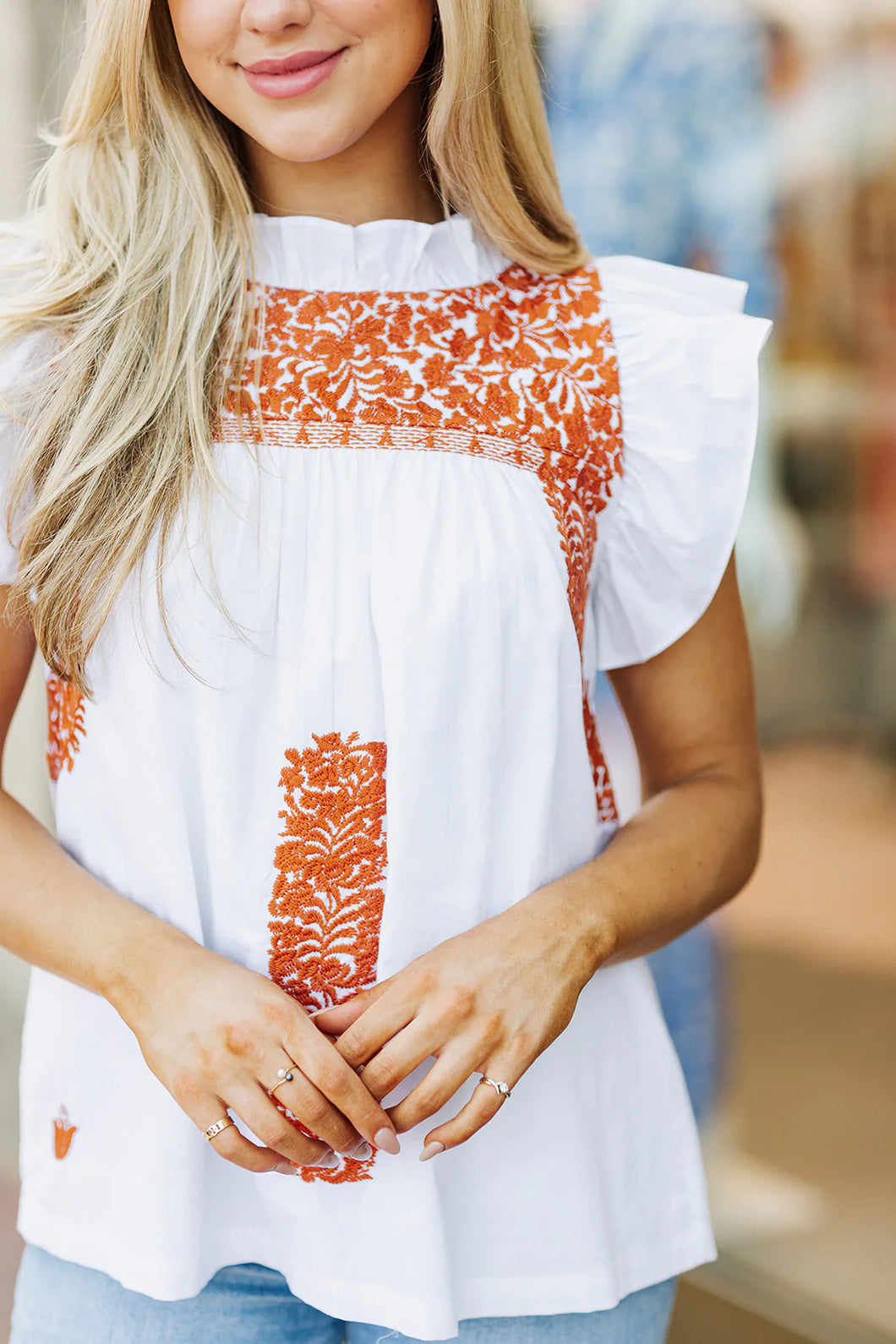 Noel White top with Burnt Orange Embroidered Flowers