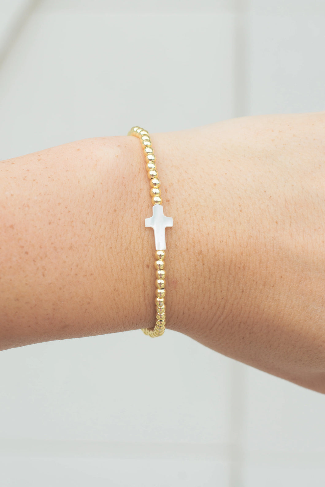 Stephanie Gold beaded Bracelet with MOP Pearl Cross